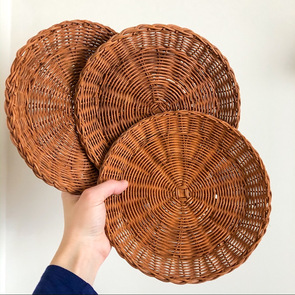 Three Rust Colored Round Flat Baskets